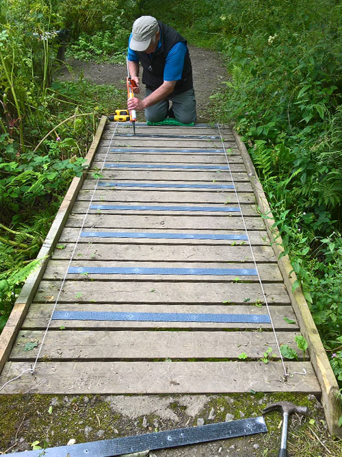 Replacing chicken wire with non-slip decking strips for the wooden footbridges throughout the Nature Reserve. Replacing chicken wire with non-slip decking strips for the wooden footbridges throughout the Nature Reserve.