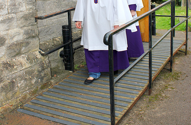 Access ramp with non slip decking strips.