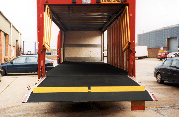 Anti-flip Floor covers applied to vehicle interior floor and ramp areas. Anti-flip Floor covers applied to vehicle interior floor and ramp areas.