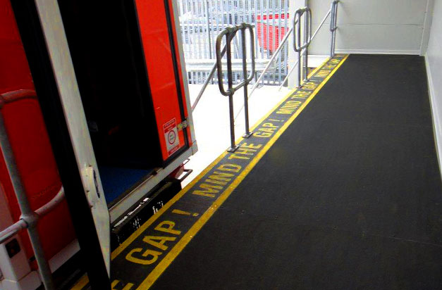 Anti-slip stair tread covers loading bay installation. Anti-slip stair tread covers loading bay installation.